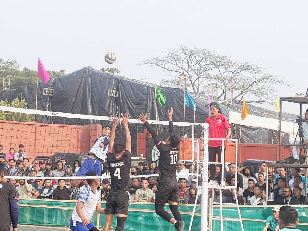 Mokokchung players (White) in action against Dimapur (Black) during their gold medal encounter in volleyball at the 3rd Nagaland Olympic and Paralympic Games 2024 at Arena D, Sovima on February 17. (Morung Photo)